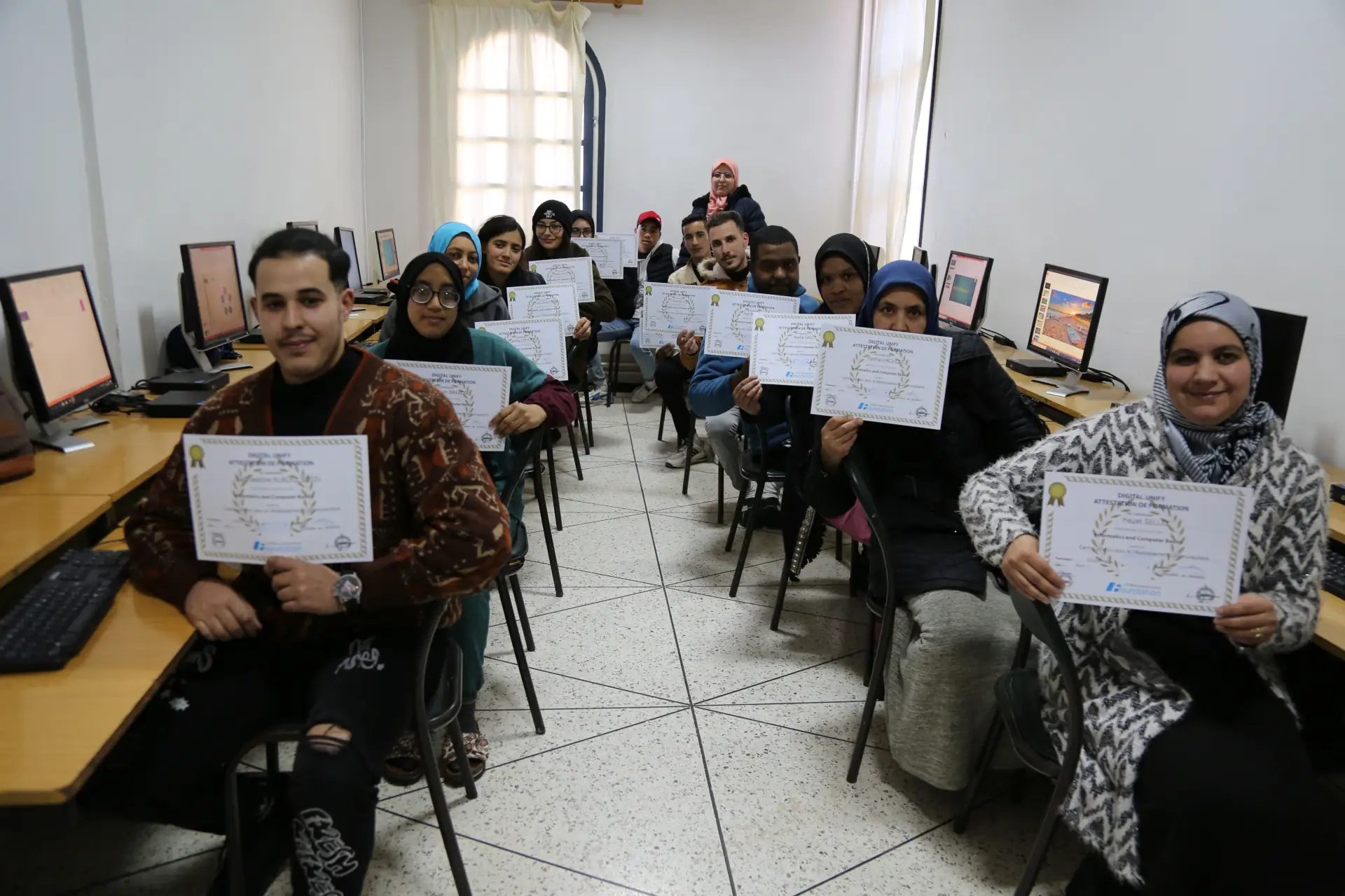 ST foundation beneficiaries in Morocco celebrating their ICB certificates